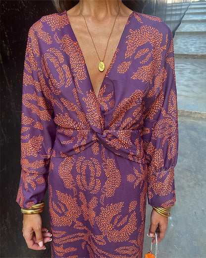 Grace – Robe midi élégante avec imprimé floral et nœud