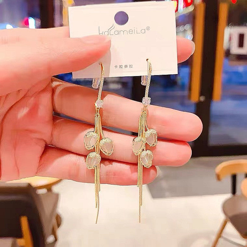 Clarisse – Boucles d'oreilles en forme de fleur avec détail lumineux