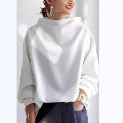 Elly | Haut en tricot doux à col montant