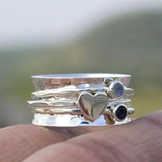 Bague élégante en forme de cœur rotatif en argent sterling